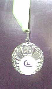 Медаль полученная компанией ЭСМА за первое место по системе CIDESCO в номинации аппаратная косметология
